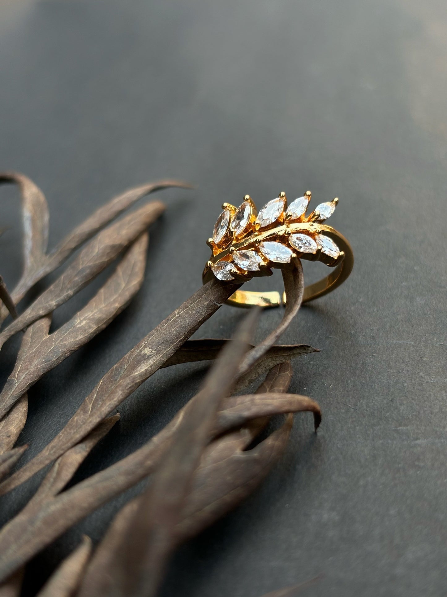 Unique fashionable wheat shape zirconia golden ring by hvjewellery.in