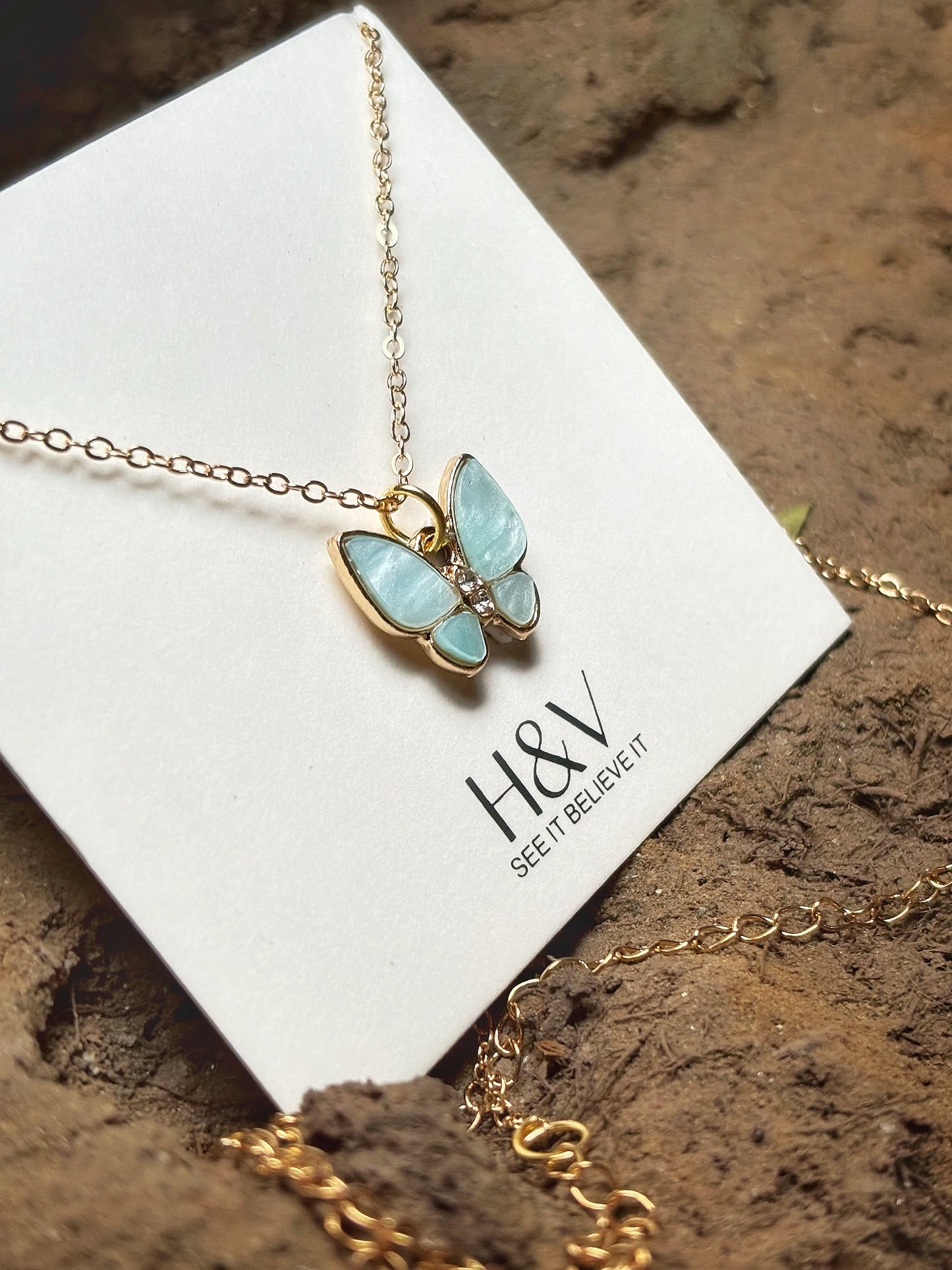 Beautiful Pendant with a sky blue butterfly by hvjewellery.in