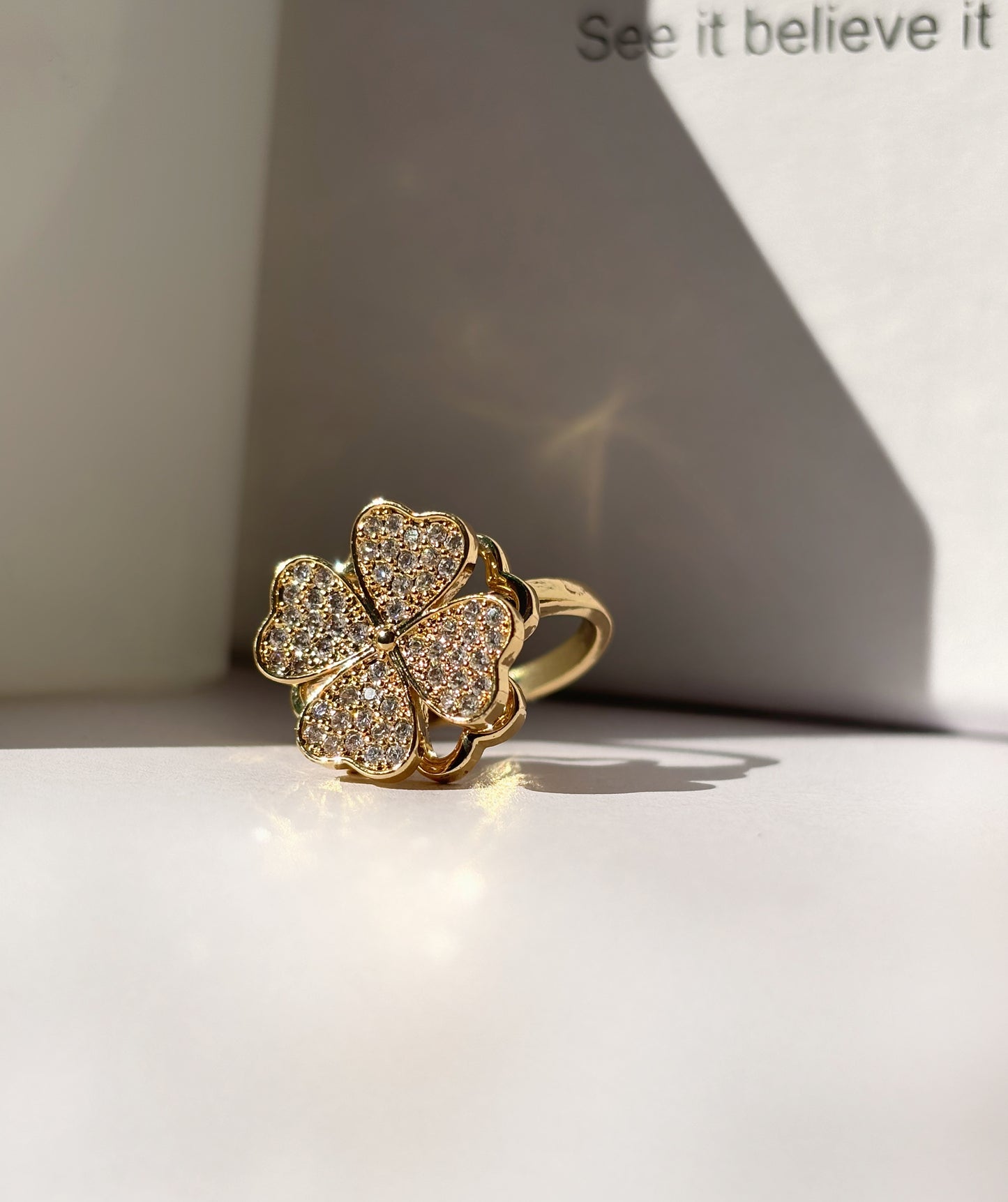 Gorgeous Four Leaf Clover Spinner Golden Ring by hvjewellery.in