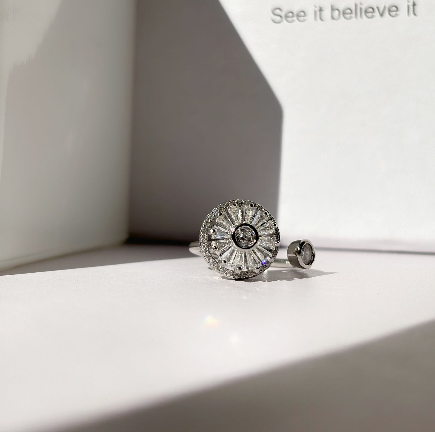 Beautiful Rotating flower cubic zirconia silver Ring by hvjewellery.in