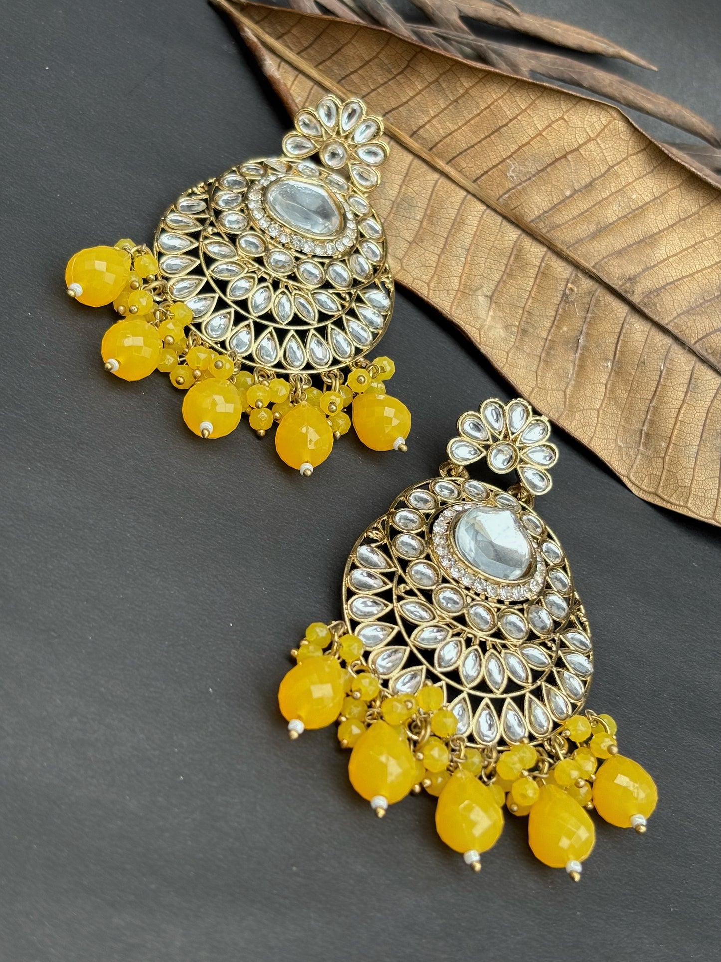 Traditional Beautiful Kundan Earring with yellow beads by hvjewellery.in