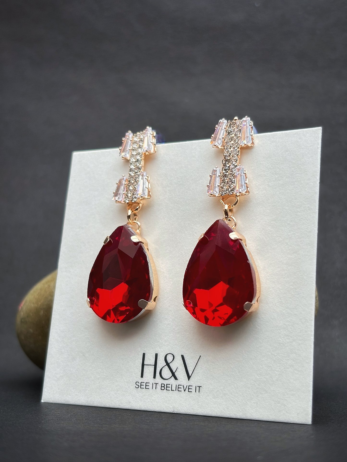 A beautiful luxurious Ruby Red earring by hvjewellery.in