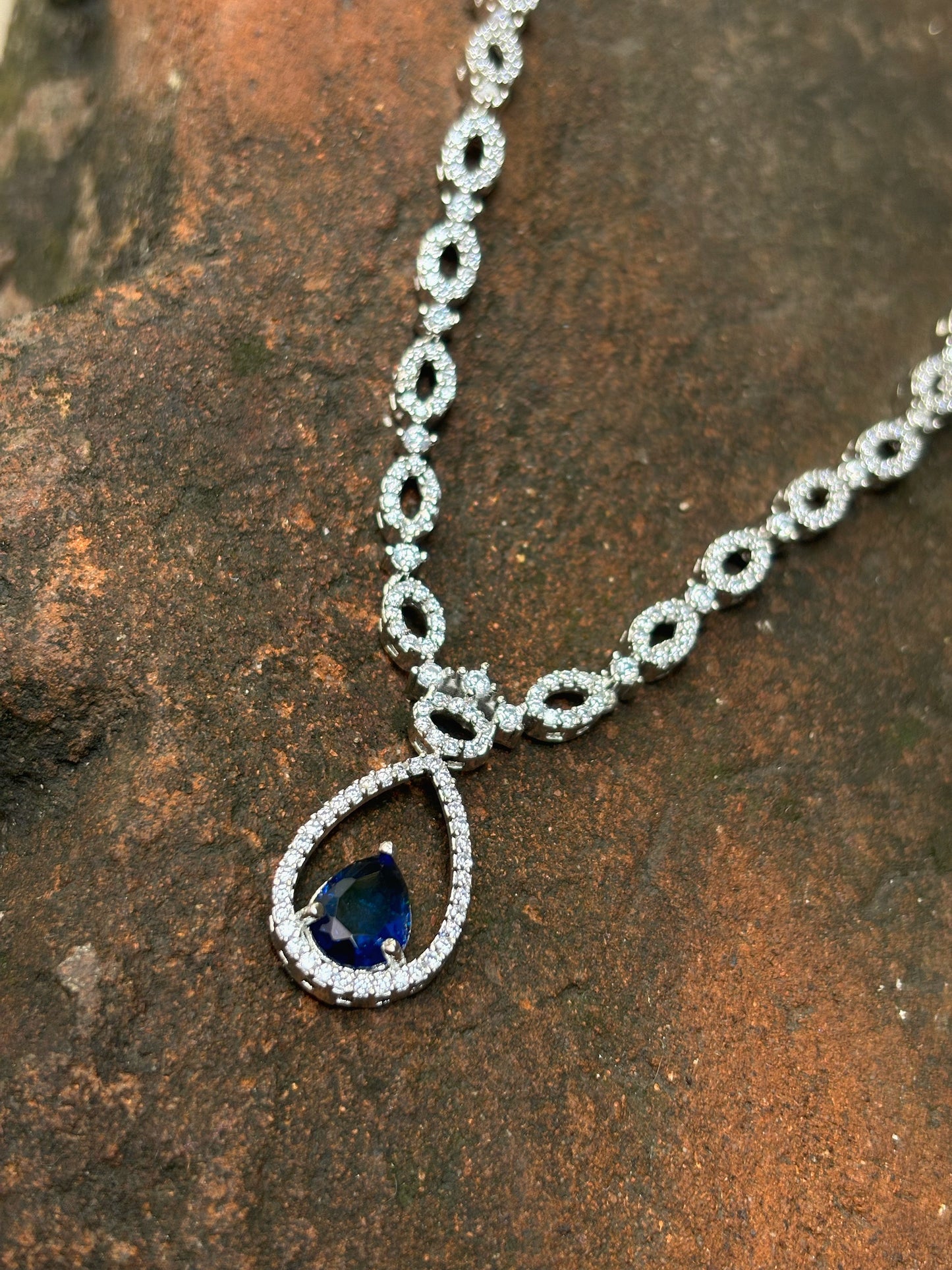 A diamond set with blue earring by hvjewellery.in