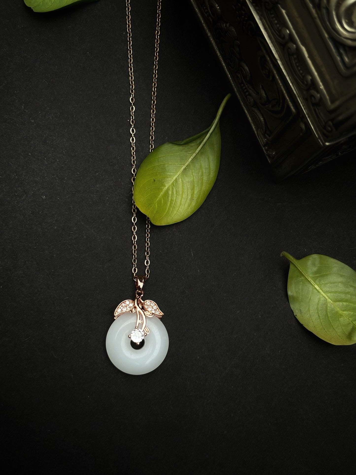 A round natural white jade necklace by hvjewellery.in