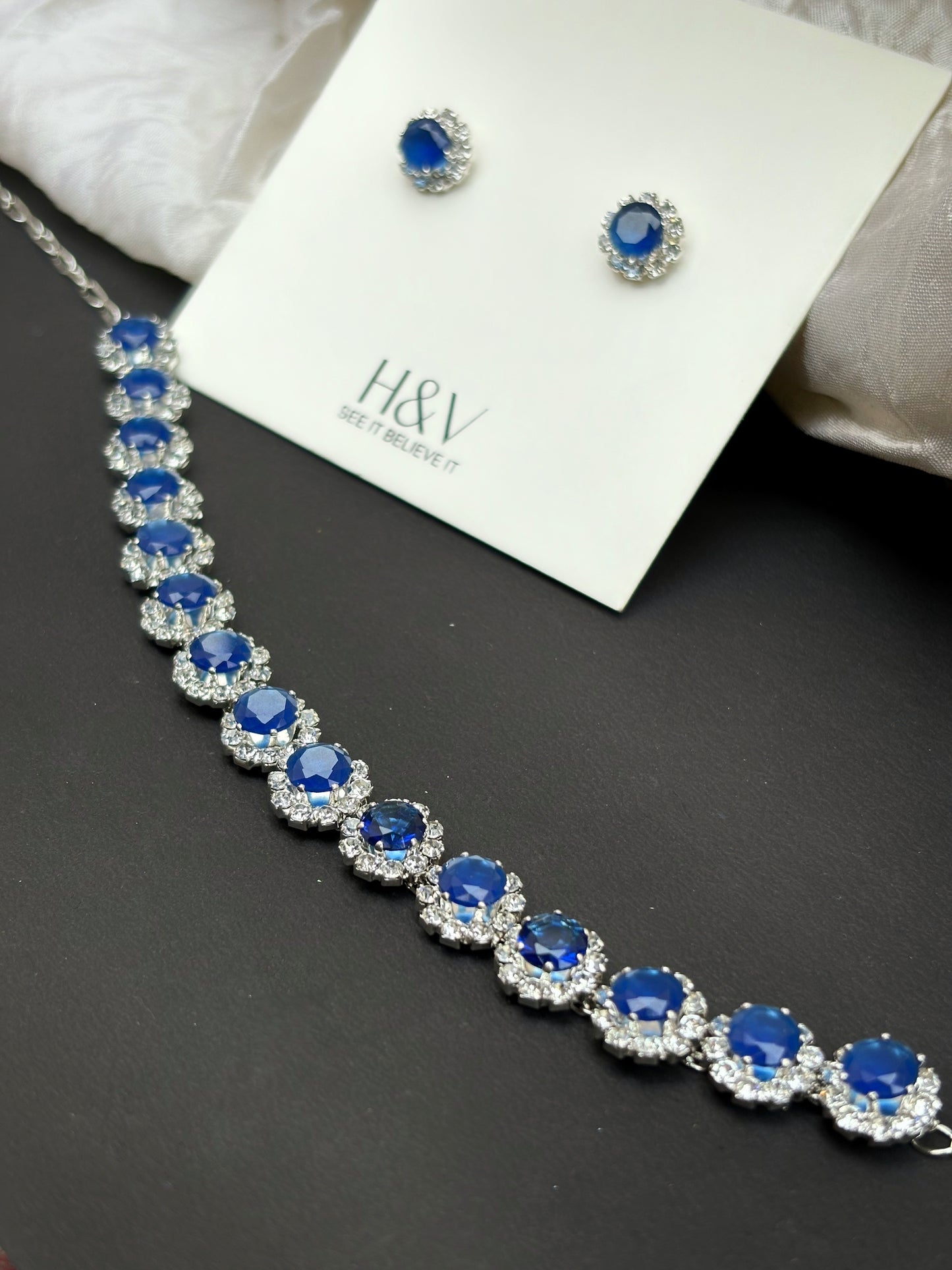 Oval shape with white zircon and blue stone flower choker by hvjewellery.in