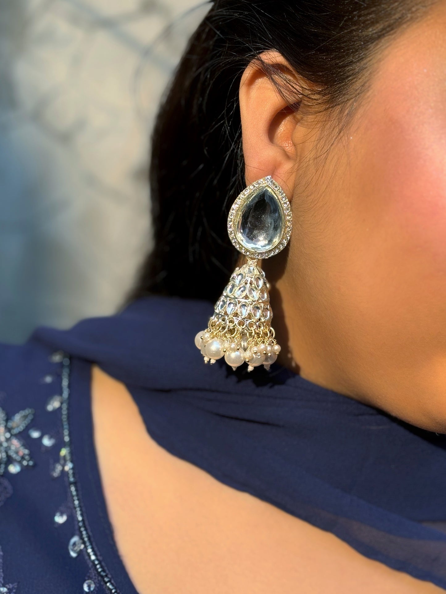 Traditional white kundan with large stone jhumka by hvjewellery.in